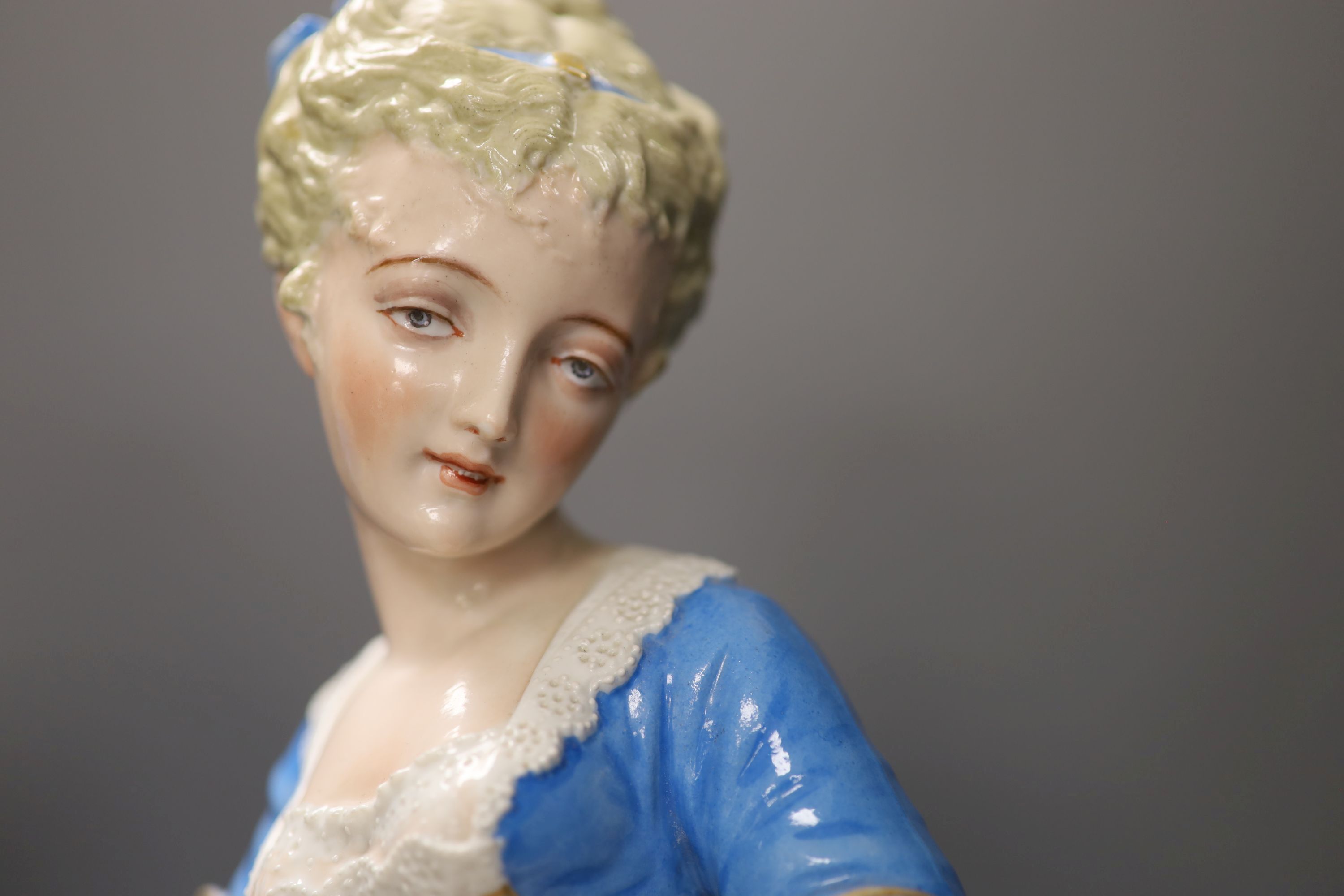 A pair of large Paris porcelain figures of a lady and gent, tallest 52.5cm